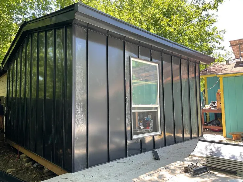 Black standing seam metal wall panels for Metal Roof Installation in Gates