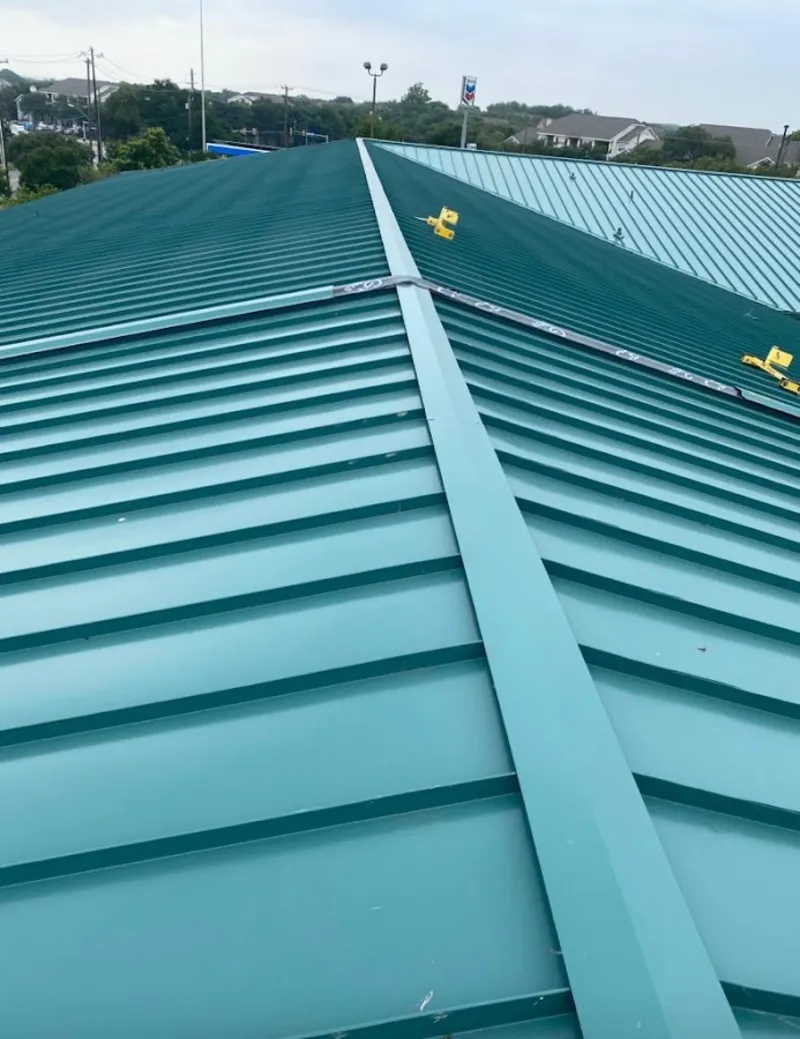 Green commercial metal roof ridge and valley for Metal Roof Repair in Gates